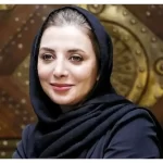 نوزادی رویا میرعلمی در آغوش پدرش