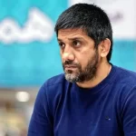 تصویر؛ تابلو عجیب در اتاق علیرضا دبیر در فدراسیون کشتی