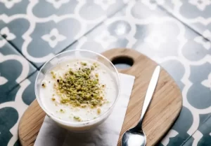 طرز تهیه فرنی نارگیلی به روش ساده و سنتی/ دسر آسان و خوشمزه برای شب یلدا